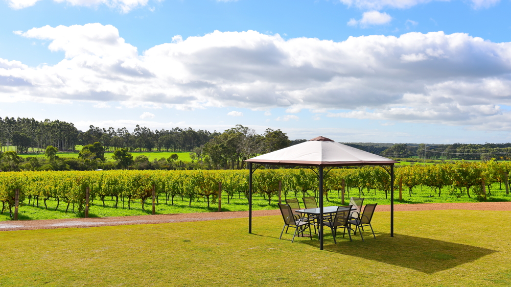 An outdoor wine and dine venue with a beautiful landscape